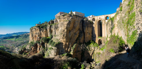 Puente Nuevo or “New Bridge” spans the 390ft (120m) deep El Tajo gorge in the city of Ronda,...