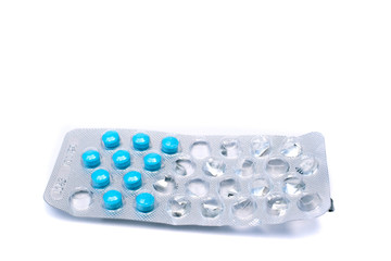blue pills in open blister, drugs