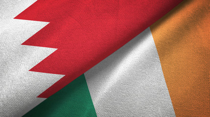 Fototapeta na wymiar Bahrain and Ireland two flags textile cloth, fabric texture
