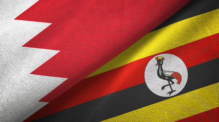 Fototapeta premium Bahrain and Uganda two flags textile cloth, fabric texture