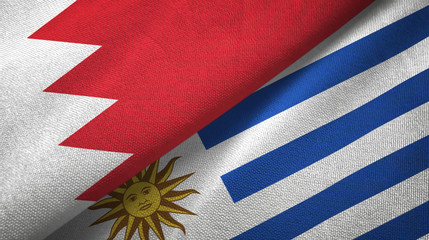 Bahrain and Uruguay two flags textile cloth, fabric texture