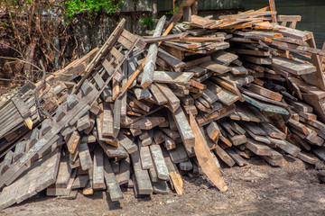 pile of old and used wooden planks