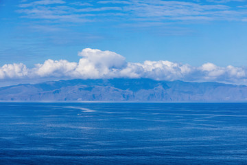 Fototapeta na wymiar View of La Gomera island from Puerto de Santiago