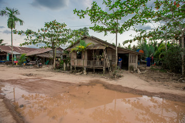 Fototapeta na wymiar Ranong - Burma Village along the Kra Buri River:March 9, 2019,the atmosphere in the Burmese community There are boat houses and shops for tourists to visit,near the Kra Buri area, the Thai-Myanmar 