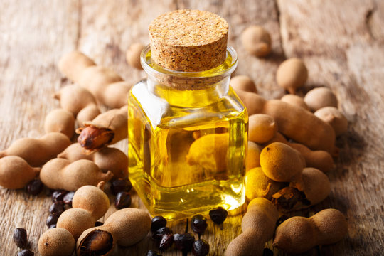 Organic healthy tamarind oil for beauty and health close-up. horizontal
