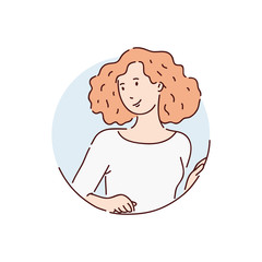 Young beautiful girl or woman with lush red hair looks out of the window from behind.