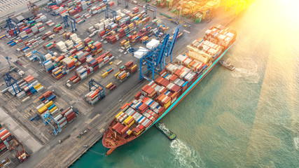 Container ship in export and import business logistics and transportation. Cargo and container box...