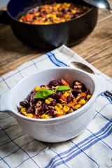 Chili corn carne on wood table