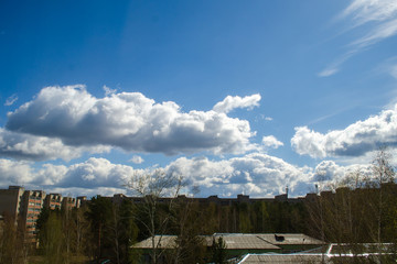 big clouds over the city. Cloudy weather