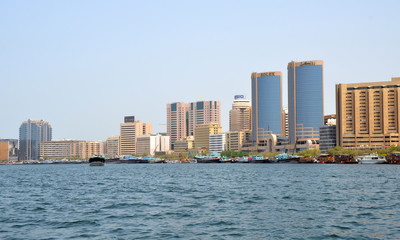Obraz premium Dubai, UAE - August 13, 2014: View on Dubai creek with its modern buildings