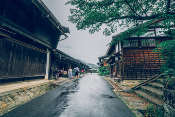 Kiso valley is the old  town or Japanese traditional wooden houses for the travelers walking at historic old street  in Narai-juku , Nagano Prefecture, JAPAN.