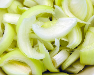Freshly peeled onionssliced. roughly