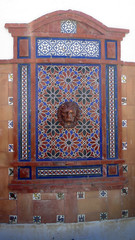 Decorative fountain head in old Tarifa, Andalusia