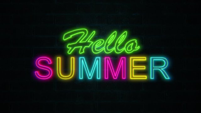 Hello Summer text in multicoloured neon lights flickering on brick wall. Holiday and travel theme concept. Travel background. 