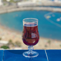 Delicious sangria wine on the balcony of a hotel against sea view.