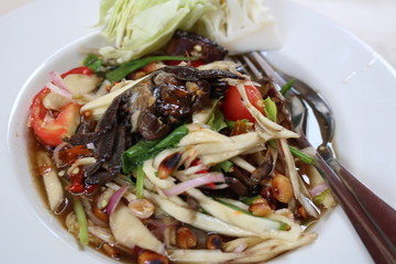 Sour and spicy papaya salad with crab