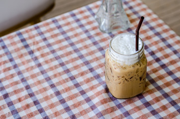 Ice coffee on the tablecloth
