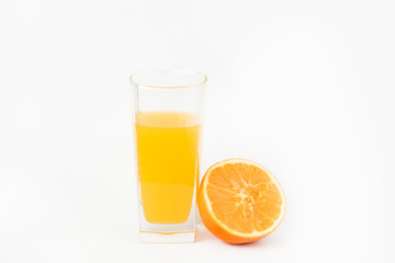 Oranges and orange juice on a white background