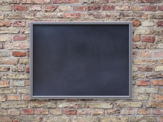 Empty black board (chalkboard) on black wall - 3D rendering