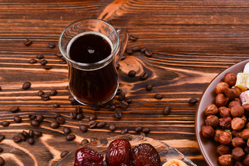 Sweet baklava on plate with coffee.