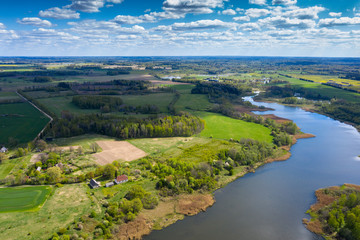 Fototapeta premium Lake in spring aftenoon in Aizpute, Latvia.