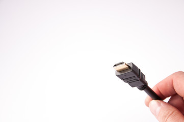 black cable hdmi connect in hand