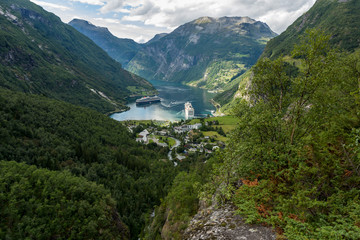 View over Geiranger town and the Geiranger fjord, where many cruise ships dock during the summer. Norwegian landscape
