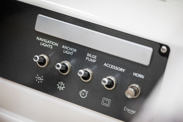 Obraz premium Control panel with switches in a luxury speed boat