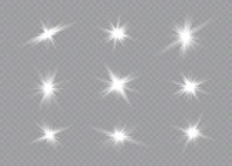 White glowing light explodes on a transparent background. Sparkling magical dust particles. Bright Star. Transparent shining sun, bright flash. Vector sparkles.