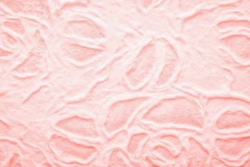 Handmade mulberry paper texture background. Pink coral color paper