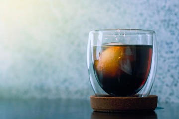 A glass of ice black coffee in coffee cafe