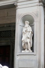 Statue of LEONARDO DAVINCI  in the niches of the Uffizi Gallery colonnade, Florence.