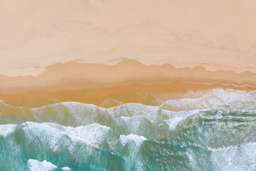 Obraz na płótnie Canvas Atlantic ocean sandy beach with turquoise ocean and waves. Aerial view