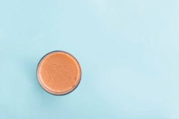 Chocolate smoothie  in blue background