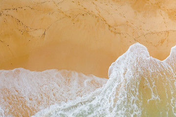 Atlantic ocean sandy beach with turquoise ocean and waves. Aerial view