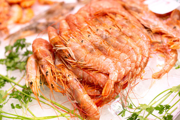 Big fresh natural shrimps on ice. Close up of traditional premium seafood