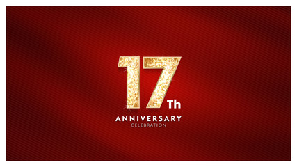 17th Anniversary celebration - Golden numbers with red fabric background	