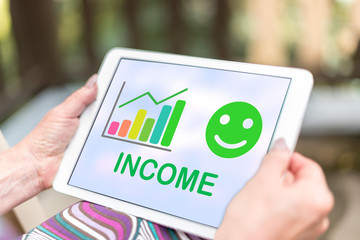 Income growth concept on a tablet