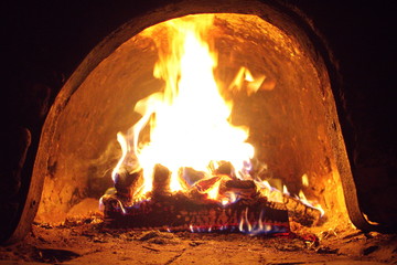 Hot yellow fire in the stove