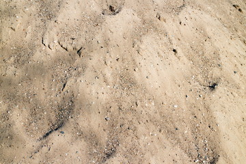 heap of yellow sand close up