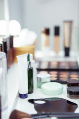 Close up of a table with cosmetics on it