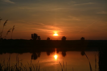 Fototapeta premium a sunset on the lake