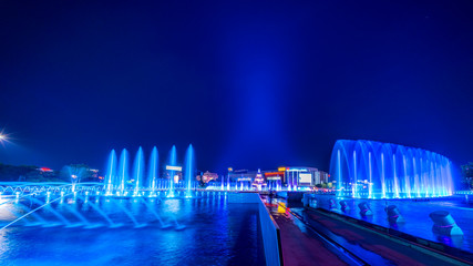 Spectacular blue light waterworks in downtown Bucharest wide