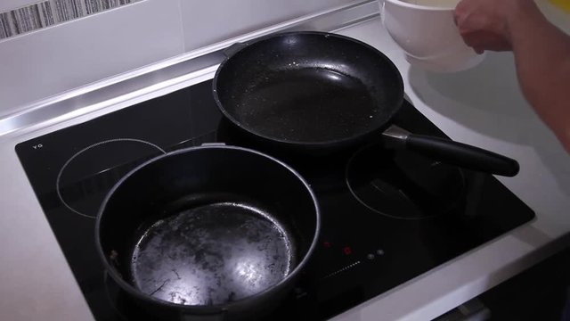 Frying pans on the induction hob.