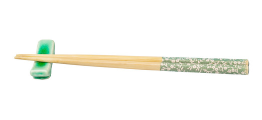 side view decorated chopsticks on chopstick rest