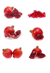 Set of pomegranate fruits with green leaf and cuts isolated on white background