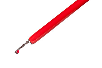 ink drop on tip of red nib pen close up