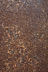 Dark worn rusty metal texture background.