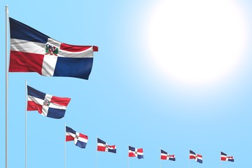 pretty many Dominican Republic flags placed diagonal on blue sky with place for text - any celebration flag 3d illustration..