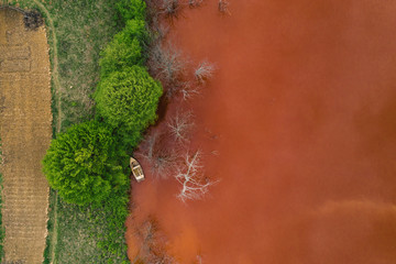 Drone view of contaminated, toxic water stream in Geamana, Romania